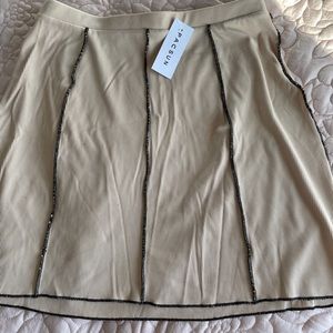 super cute tan skirt:)